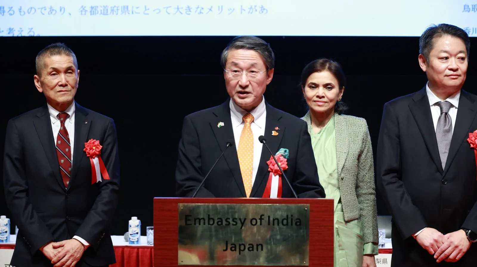 Tottori Governor Shinji Hirai delivering a statement at the Embassy of India podium in Tokyo.